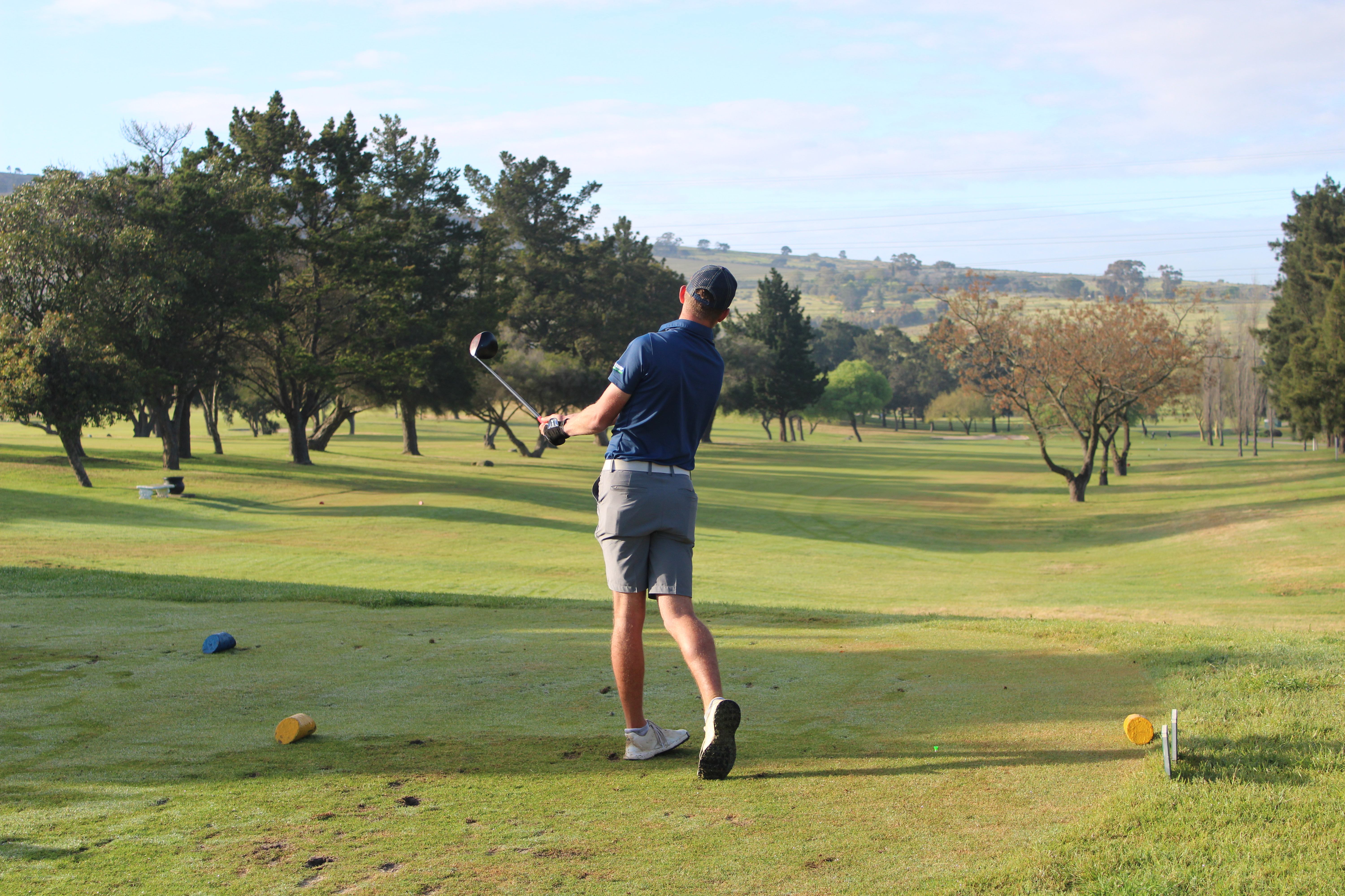 Golfer practicing on course